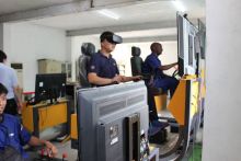 Virtual Simulation VR Simulator of Wheeled Excavator for Teaching Assessment and Training
